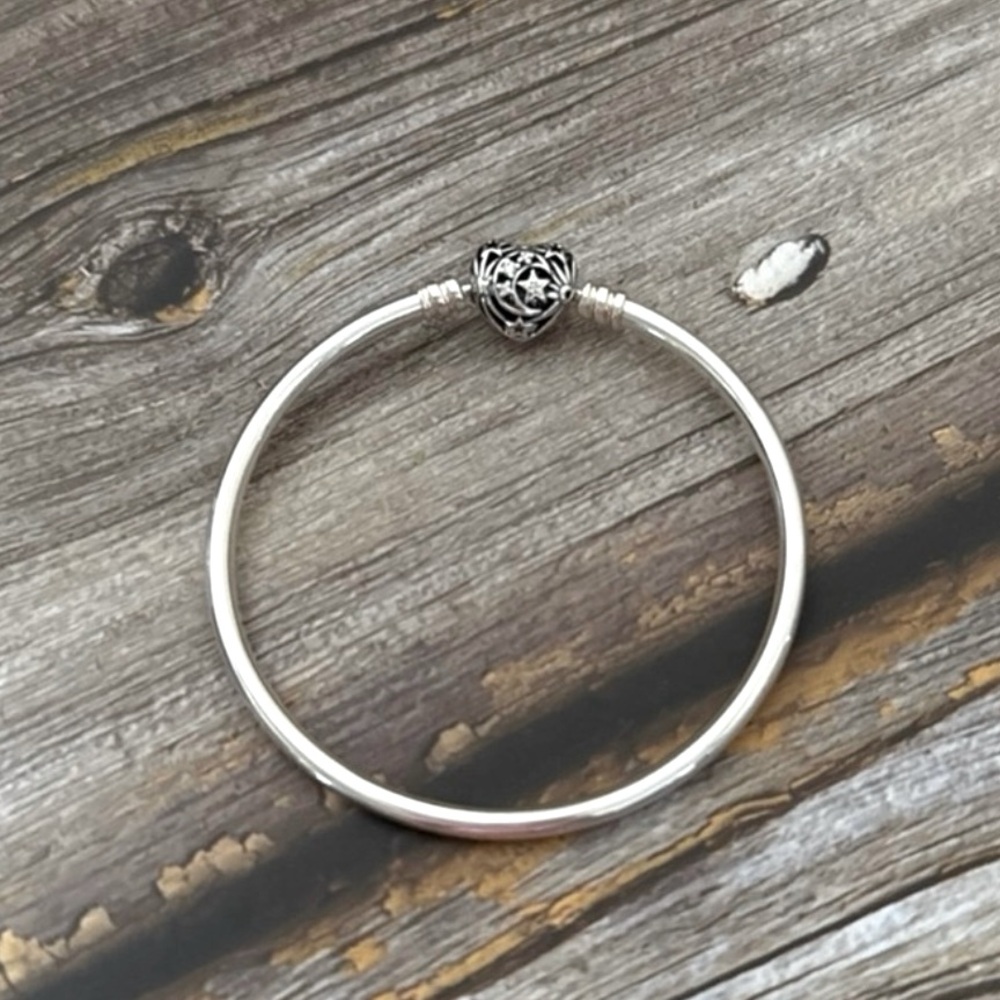 Pandora Celestial Heart
Clasp Bangle, sterling silver NWOT 6”
